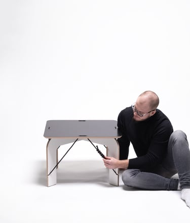 SOLIDO zero-waste coffee table: CNC-cut plywood sheet transforming into legs and tabletop with jute