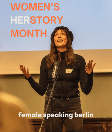 Young woman, speaking behind microphone, confident and engaging.