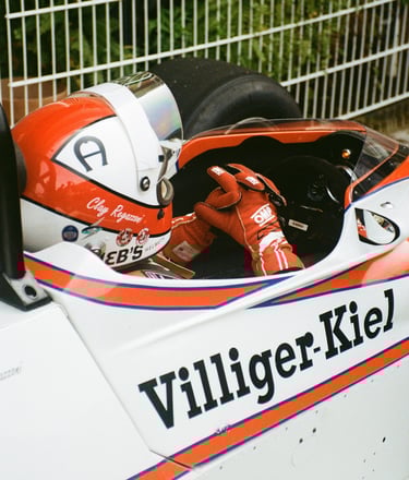 a race car driver getting ready before the race
