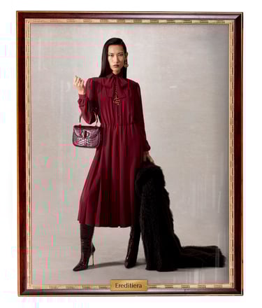 Gucci Spring Summer 2026 – “Ereditiera” deep red dress with bow.