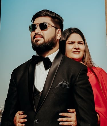 Couple posing in a rustic setting for their pre wedding photo
