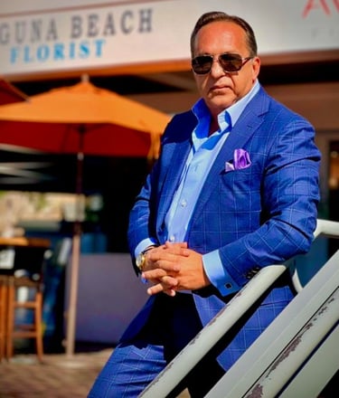 A headshot of Bedig Minassian, the brand's founder, smiling in a blue suit