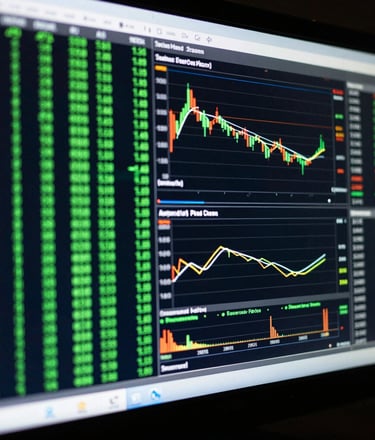 Macro shot of high-resolution trading monitor displaying clean green terminal code and real-time market data charts, low-key ambient room light, cool monitor glow, 35mm