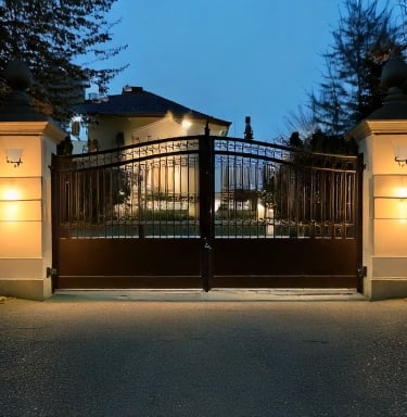 a gated gated entrance to a house