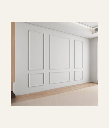 Elegant white wall with classic decorative picture frame wall molding and wainscoting panels.