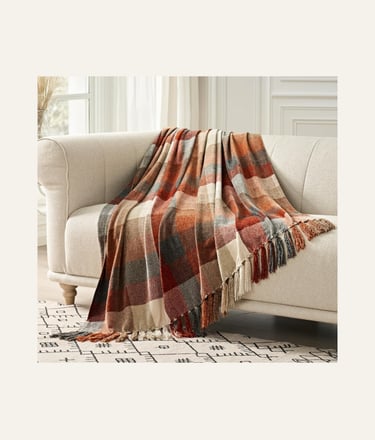 Picture of Plaid Chenille Throw Blanket on a couch