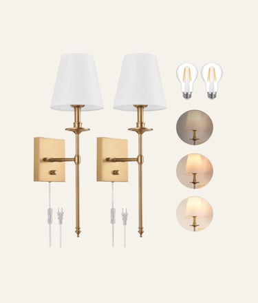 Set of two antique brass wall sconces with white fabric shades and dimmable LED bulbs for bedroom lighting.