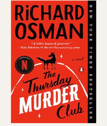 book cover with wolf silhouette of The Thursday Murder Club novel