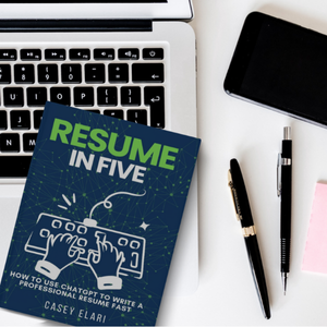 a resumen on a desk with a pen and a notebook
