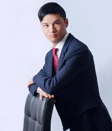 a man in a suit and tie is posing for a photo