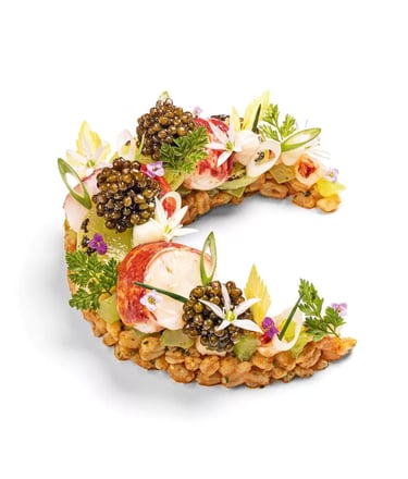 Exquisite lobster and caviar gourmet dish, elegantly plated for fine dining connoisseurs.