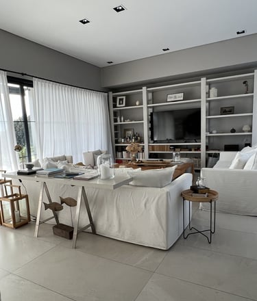 a living room with a couch and a table