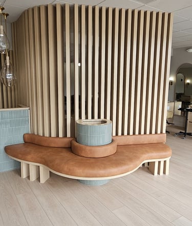 Modern Luxurious Hair Saloon In Boca Raton featuring custom handle less cabinetry 