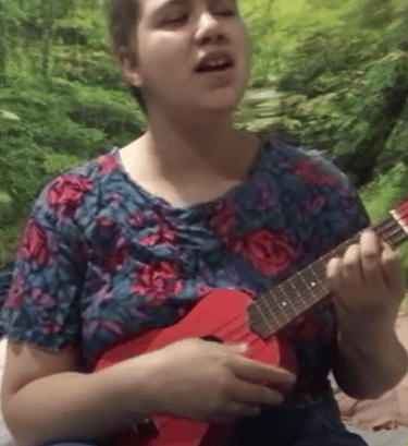 Me, Ella, Holding my ukulele and singing