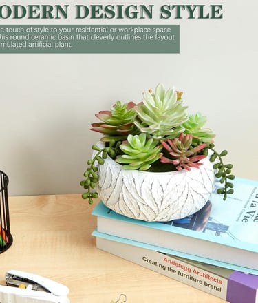 Stylish round ceramic basin with artificial succulents, ideal for modern office or home decor.