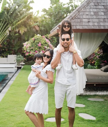 Playful family session outdoors at a private villa in Seminyak Bali.