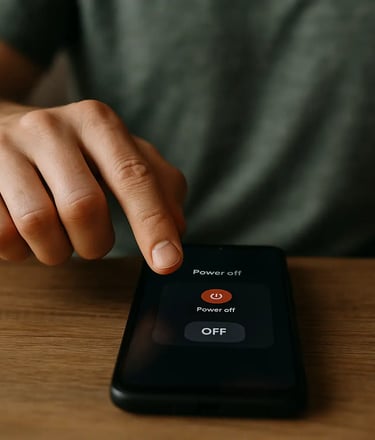 Person turning off smartphone for digital detox and mental relaxation