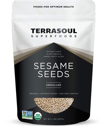 a bag of sesame seeds on a white background