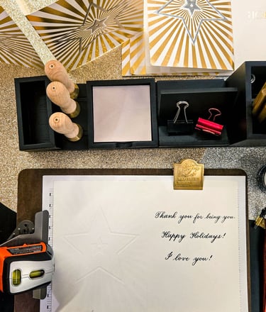 A calligrapher's desk set-up for brand activation by NYC calligrapher Handwritten by Belle.
