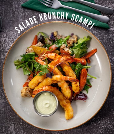 Salade Krunchy Scampi van Krunch Gent: frisse salade met krokante scampi en huisgemaakte dressing