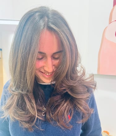 Finished layered haircut with soft waves by Francis Hair & More in Miami