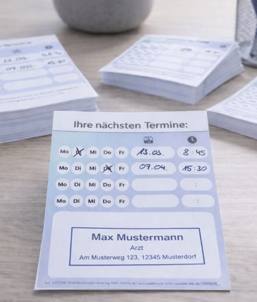 Handwritten doctor appointment reminder card on a medical desk with stethoscope and pen.