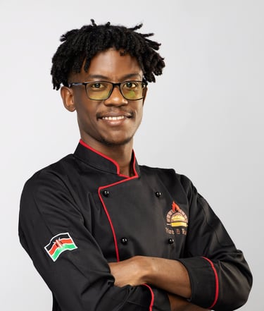 a man in a chef's uniform with a chef's coat