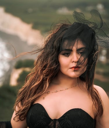 Woman in black dress posing outdoors – creative portrait photography in Kent by Fred Art Studio