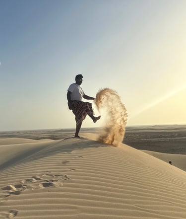 Socotra island tour a man kicking sand