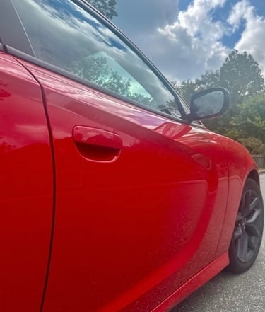 Red Dodge Charger lock representing auto locksmith in Arden, NC including lockout, key duplication, & ignition repair