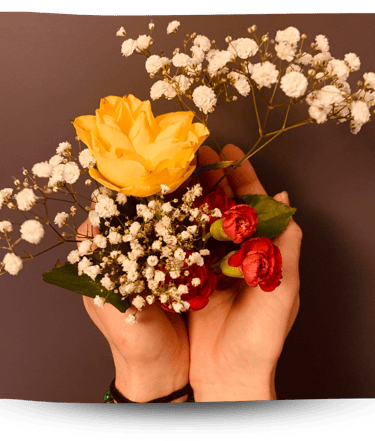 Martina holding flowers in her hands