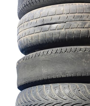 Worn out car tyres in a tire repair shop Nigeria