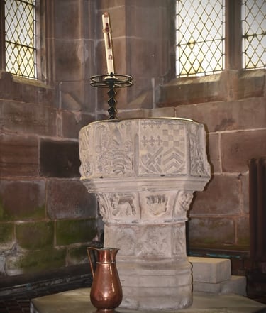 photograph of a stone church font.