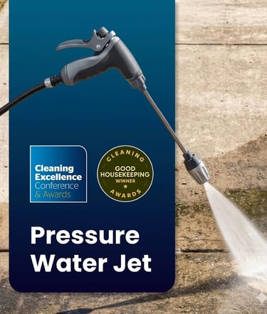 Pressure water jet sprayer cleaning a concrete driveway.