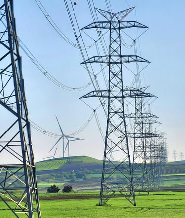 Power lines running through a field