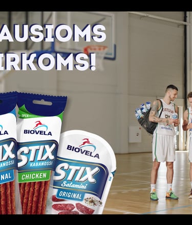 a group of men standing around a basketball court