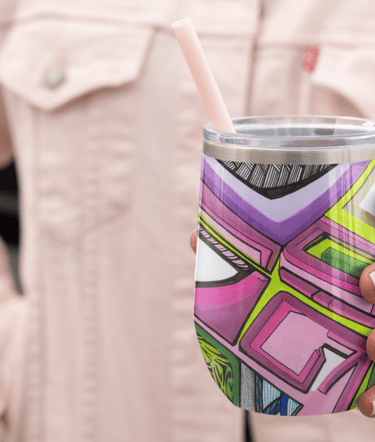 a person holding a cup of coffee and a drink