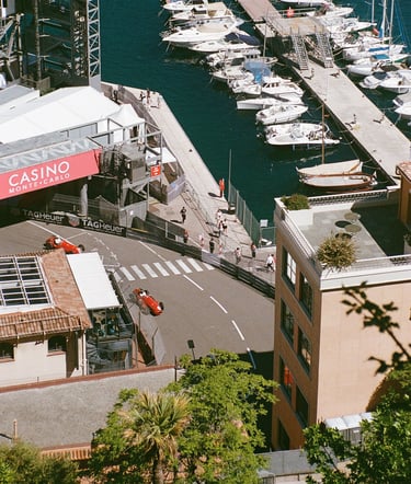 race cars driving on the Monaco Grand Prix circuit