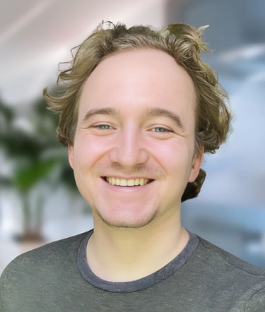 a man with a beard and a beard smiling