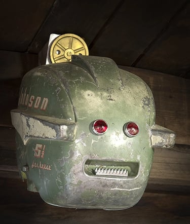 Assemblage robot head named Johnson built by artist Tal Avitzur.