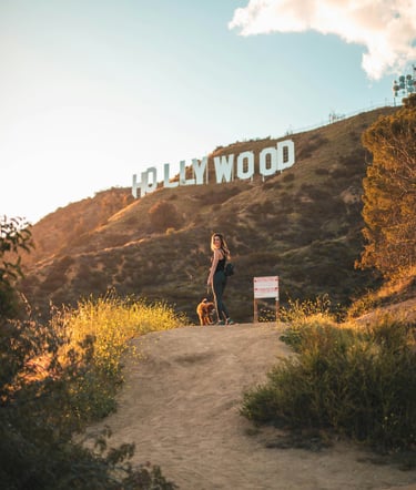 woman-with-dog-hollywood-sign-hike