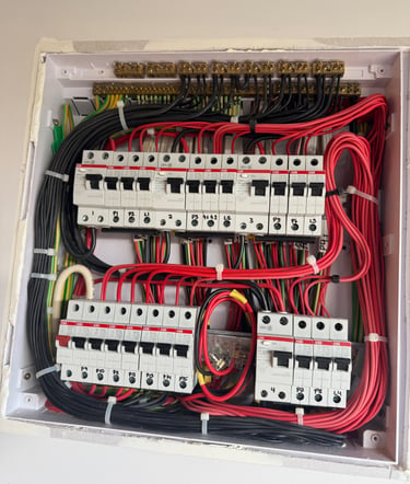 Electrical switchboard by Electrician attending emergency power outage 