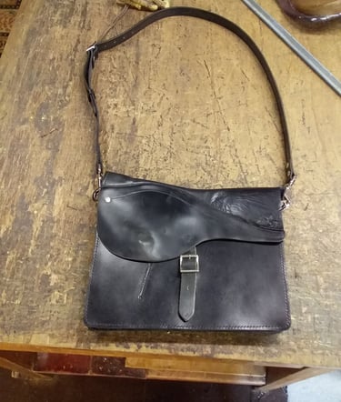 saddle transformed into laptop bag