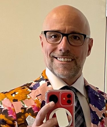 Dr. Louis Abate is a colorful a person as the jacket he is wearing