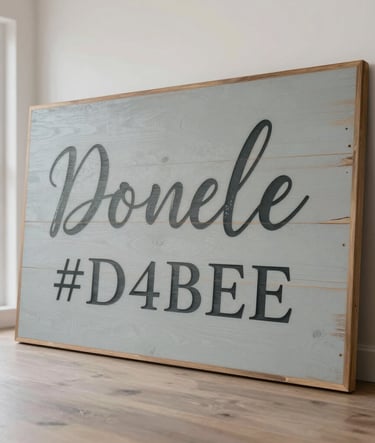 A large, professional vertical shot of a custom handcrafted wood sign with rustic touches and #D4BEAE tones. The sign features elegant calligraphy and is displayed in a bright, modern interior.