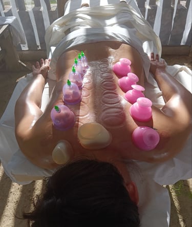 Alex Naumov applying deep pressure massage to release stored trauma and muscular tension 