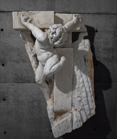 White marble sculpture depicting a child inserted into a stone cross, attached to a gray wall.