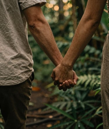 An intimate, grainy film-style shot of a couple's hands intertwined while walking through a lush Bali jungle, warm golden hour lighting, deep forest greens #2A362B and earthy taupe #C7B7A3 in the shadows.