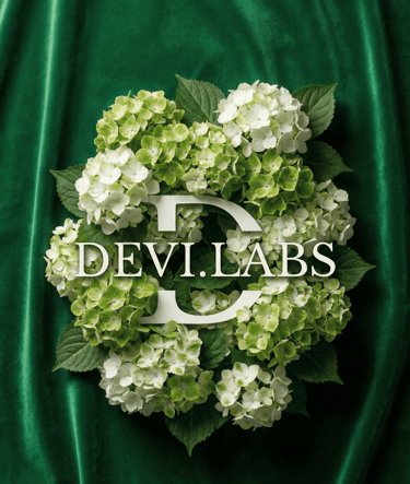 devi.labs brand logo framed by green hydrangea flowers, symbolizing high-quality AI video production