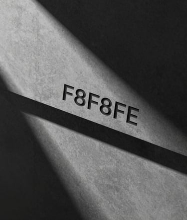 Minimalist architectural detail featuring a sharp play of shadows and light on a dark concrete surface, utilizing high contrast between #000000 and #F8F8F8, reflecting a refined and modern brand identity.